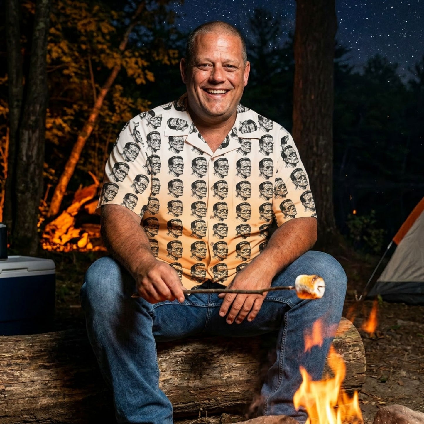 "Frankenstein Head" men’s Hawaiian shirt with gothic horror creature graphic in monster aloha pattern; on model roasting a marshmallow over a campfire at night.
